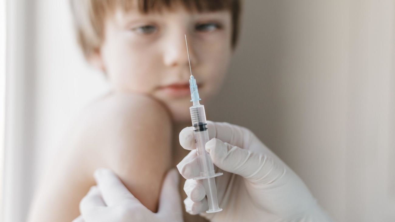 doctor-with-gloves-getting-vaccine-for-kid